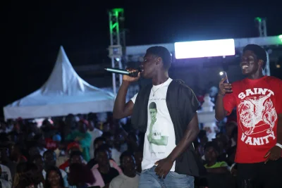 Jomasco Waves performing live on stage in front of a crowd